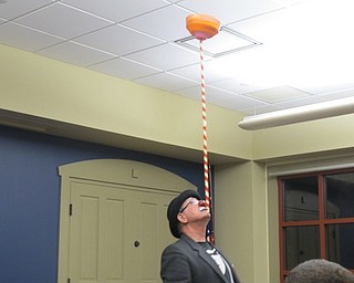 Neighbors | Alexis Bartolomucci.Jocko the Clown balanced a spinning bowl on his chin during his performance at the Boardman library on Oct. 18.