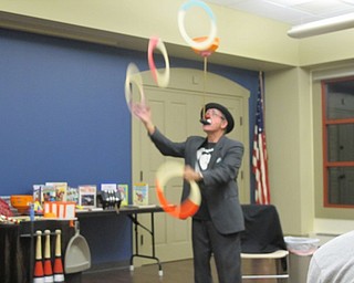 Neighbors | Alexis Bartolomucci.Jocko the Clown balanced a spinning bowl and juggled rings as one of his last performances during his show on Oct. 18 at Boardman library.