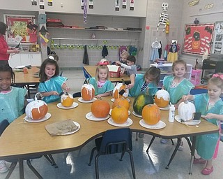 Neighbors | Submitted.The girls in Joy Bucci's class worked on painting their pumpkins on Oct. 18 for Halloween at Poland North Preschool.
