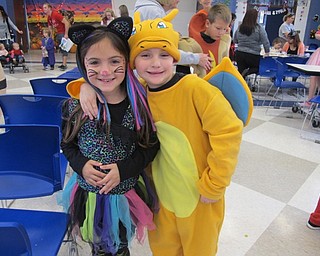 Neighbors | Alexis Bartolomucci.Corrine and Justin Arroyo dressed up in their Halloween costumes for the Halloween Carnival on Oct. 29 at Poland McKinley Elementary School.