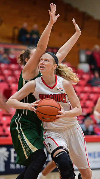 YOUNGSTOWN, OHIO - NOVEMBER 23, 2016: Sarah Cash #23 of YSU moves to the basket around Bre Nauman #50 of Tiffin during the first half of their game Wednesday night at the Beeghly Center. DAVID DERMER | THE VINDICATOR