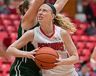 YOUNGSTOWN, OHIO - NOVEMBER 23, 2016: Sarah Cash #23 of YSU moves to the basket around Bre Nauman #50 of Tiffin during the first half of their game Wednesday night at the Beeghly Center. DAVID DERMER | THE VINDICATOR