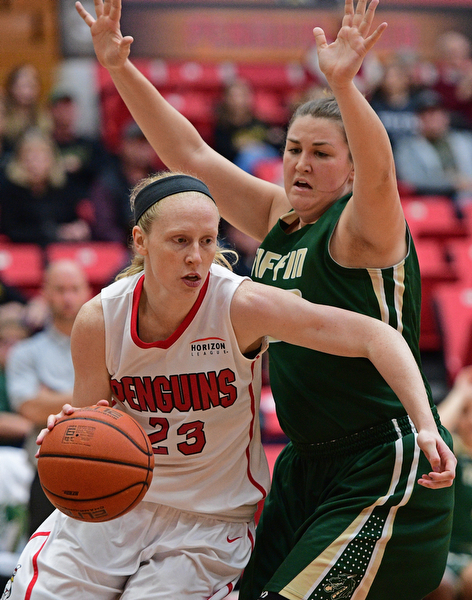YOUNGSTOWN, OHIO - NOVEMBER 23, 2016: Sarah Cash #23 of YSU dribbles around Bre Nauman #50 of Tiffin during the first half of their game Wednesday night at the Beeghly Center. DAVID DERMER | THE VINDICATOR
