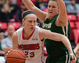 YOUNGSTOWN, OHIO - NOVEMBER 23, 2016: Sarah Cash #23 of YSU dribbles around Bre Nauman #50 of Tiffin during the first half of their game Wednesday night at the Beeghly Center. DAVID DERMER | THE VINDICATOR
