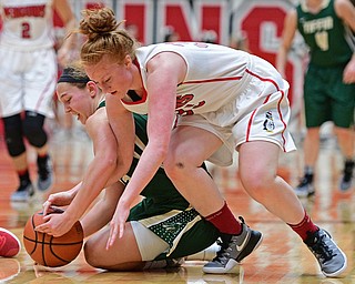 YOUNGSTOWN, OHIO - NOVEMBER 23, 2016: Kelly Wright #35 of YSU attempts to wrestle the ball away from Allie Miller #23 of Tiffin during the first half of their game Wednesday night at the Beeghly Center. DAVID DERMER | THE VINDICATOR