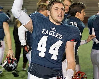 MICHAEL G TAYLOR | THE VINDICATOR- 11-26-16- JFK's #44  Jacob Coates celebrates the victory. OHSAA D7 Football Semi  John F Kennedy Eagles vs Canal Winchester Harvest Prep Warriors at Woody Hayes Quaker Stadium in New Philadelphia, OH.
