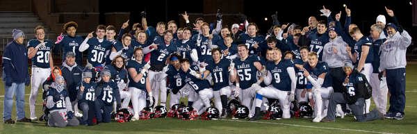 MICHAEL G TAYLOR | THE VINDICATOR- 11-26-16-  JFK's Eagles team celebrates their victory. OHSAA D7 Football Semi  John F Kennedy Eagles vs Canal Winchester Harvest Prep Warriors at Woody Hayes Quaker Stadium in New Philadelphia, OH