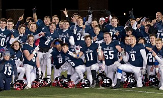 MICHAEL G TAYLOR | THE VINDICATOR- 11-26-16-  JFK's Eagles team celebrates their victory. OHSAA D7 Football Semi  John F Kennedy Eagles vs Canal Winchester Harvest Prep Warriors at Woody Hayes Quaker Stadium in New Philadelphia, OH