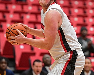 YOUNGSTOWN, OHIO - NOVEMBER 26, 2016: Jorden Kaufman #32 of YSU goes to the basket during the first half of their game Saturday afternoon at the Beeghly Center. DAVID DERMER | THE VINDICATOR