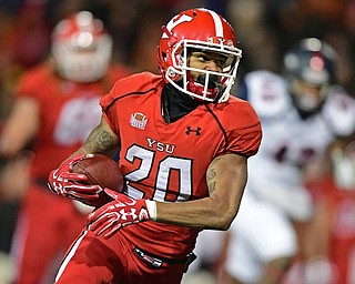 YOUNGSTOWN, OHIO - NOVEMBER 26, 2016: Jody Webb #20 of YSU turns upfield to run with the ball during the second half of their playoff game Saturday evening at Stambaugh Stadium. Youngstown State won 38-24. DAVID DERMER | THE VINDICATOR