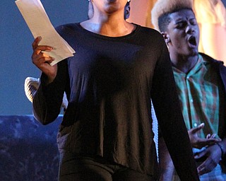 (Nikos Frazier | The Vindicator)..Desiree Woodland, who plays a Midwife in "Nativity, The Hope" at Youngstown Playhouse in Youngstown on Sunday, Nov. 27, 2016.