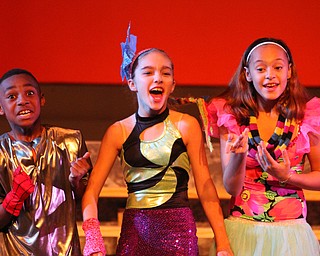 (Nikos Frazier | The Vindicator)..Brayden Bryant, 8, Natalee Balestra, 12, and Inayrish Garcia, 11 perform "Kids Rule" at rehearsal for "Nativity, The Hope" at Youngstown Playhouse in Youngstown on Sunday, Nov. 27, 2016.