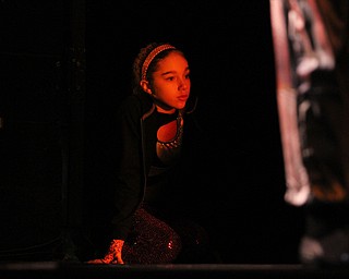 (Nikos Frazier | The Vindicator)..Natalee Balestra, 12, who plays Saturn, waits behind stage at rehearsal for "Nativity, The Hope" at Youngstown Playhouse in Youngstown on Sunday, Nov. 27, 2016.