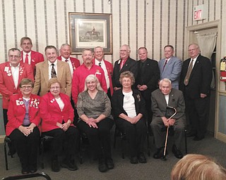 SPECIAL TO THE VINDICATOR
Canfield Lions hosted the annual Past District Governors Dinner meeting Oct. 28 at A La Cart Catering, Canfield. Governors and spouses from Ohio Lions District OH 4 attended the social hour and dinner, followed by a business meeting led by Past District Governor Tom Zickefoose of Austintown Lions. District OH 4 consists of 64 clubs in Ashtabula, Carroll, Columbiana, Geauga, Lake, Mahoning, Portage, Stark and Trumbull counties. Past district governors, in front from left, are Wallie Burnett, North Coast; Verna Williams, Warren; Betty Robbins, Newton Falls; Barbara Sorkin, Rootstown; and Ted Filmer, Canfield. In the second row are Bob Allgood, East Liverpool; Paul Metrovich, Calcutta; and Zickefoose. In back are Chuck Allcorn, Sebring; Bob Booher, Canal Fulton; Tom Kirkbride, Lisbon; John Woodside, Jackson Township; Ron Clifton, Youngstown; Don Heldman, Wellsville; and Jerald McCullough, Niles. Information on joining the club is available at www.lions13oh4.org.