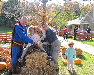 Neighbors | Alexis Bartolomucci.Chris McCarty and his wife Maureen McCarty took a picture with their family, Diane McCarty, and her children during the Fall Fun event at Beeghly Oaks on Oct. 23.