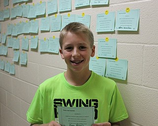 Neighbors | Abby Slanker.A Canfield Village Middle School seventh-grade student signed the Say Something Pledge during Say Something Week, a Sandy Hook Promise event, on Oct. 28.