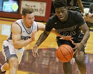 William D. Lewis The vindicator  Boardman's Mike Melewski(4)and Harding's Marlin Richardson(24)go for the ball during 12022016 action at Boardman.
