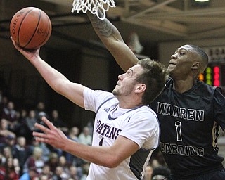 William D. Lewis The vindicator  Boardman's John Ryan(1) shoots around Harding's Derek Culver(1) during 12022016 action at Boardman.