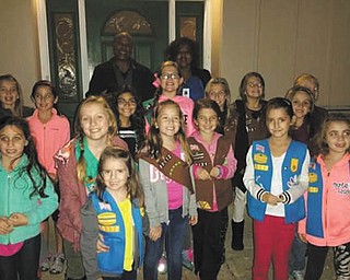 SPECIAL TO THE VINDICATOR
Girl Scout Troop 80172 of McDonald spent their November meeting doing community service delivering 20 pies throughout the community. In back are Mayor Glenn Holmes and his wife, Carol, who received a pie from the scouts. Each pie was accompanied by a card that explained why the troop chose to donate a pie to that individual. McDonald troop leaders are Jacklyn Kuntz and Jenna Evans.