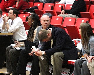 (Nikos Frazier | The Vindicator)..Youngstown State University Penguins head coach Andre Payne looks down during the second half as Youngstown State University takes on Saint Francis University at the Beeghly Center in Youngstown on Saturday, Dec. 3, 2016.