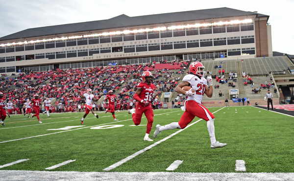 JACKSONVILLE, ALABAMA - DECEMBER 3, 2016: Running back Jody Webb #20 of YSU sprints to the end zone to score a touchdown ahead of defensive back Martavious Williams #36 of Jacksonville State during the first half of their game Saturday afternoon at Burgess-Snow Field. YSU won 40-24. DAVID DERMER | THE VINDICATOR