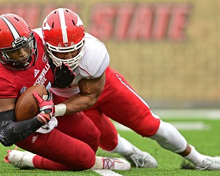 JACKSONVILLE, ALABAMA - DECEMBER 3, 2016: Quarterback Eli Jenkins #7 of Jacksonville State is sacked by Derek Rivers #11 of YSU during the first half of their game Saturday afternoon at Burgess-Snow Field. YSU won 40-24. DAVID DERMER | THE VINDICATOR
