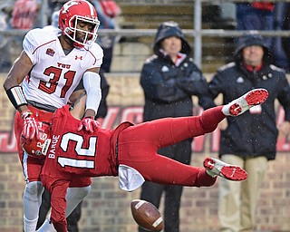 JACKSONVILLE, ALABAMA - DECEMBER 3, 2016: Defensive back David Rivers III throws receiver Josh Barge #12 of Jacksonville State to the turf after breaking up a pass on fourth down during the second half of their game Saturday afternoon at Burgess-Snow Field. YSU won 40-24. DAVID DERMER | THE VINDICATOR