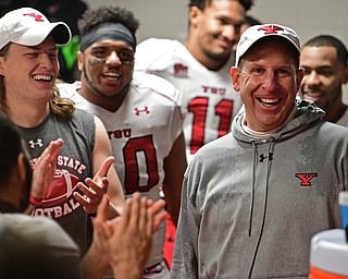 JACKSONVILLE, ALABAMA - DECEMBER 3, 2016: Head coach Bo Pelini of YSU smiles in the locker room after the teams playoff victory Saturday afternoon at Jacksonville State. DAVID DERMER | THE VINDICATOR