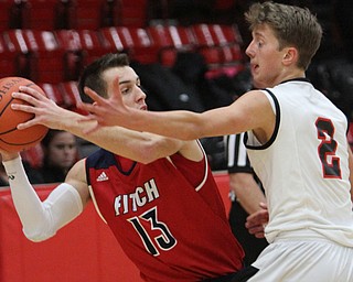 William D. Lewis The Vindicator Struthers' Austin Maynard(2) defends against  Ryan Sheffield(13) of Fitch during 12062016 action at Struthers.