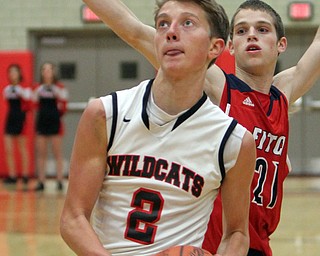 William D. Lewis The Vindicator Struthers' Austin Maynard(2) drives past Dylan Beany(21) of Fitch during 12062016 action at Struthers.