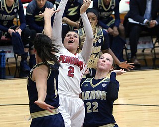 Youngstown State's Alison Smolinski (2) goes up for a jump shot while being defended by Akron's Alli Ball (1) and Hannah Plybon (22) during the first half of Tuesday nigths matchup at the Beeghly Center.  Dustin Livesay  |  The Vindicator  12/6/16  Beeghly Center, YSU