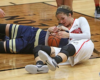 Youngstown State's Alison Smolinski fights for a loose ball with Akron's Haliegh Reinoehl (5) during the first half of Tuesday nigths matchup at the Beeghly Center.  Dustin Livesay  |  The Vindicator  12/6/16  Beeghly Center, YSU