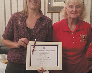 SPECIAL TO THE VINDICATOR

Monica Craven, executive director of Habitat for Humanity of Mahoning Valley, recently spoke to Canfield Lions Club. Habitat will soon include Columbiana County as part of its outreach. Craven explained what Habitat is, how it works and how to become volunteers. Restore, a part of Habitat, sells a variety of new and gently used items, including building materials. From left, are Craven and Mary Ann Dzuracky, Canfield Lions president. To become a volunteer, call Craven at 330-743-7244, ext. 310 or email her at Director@HabitatMahoning.org. For information about Canfield Lions, visit www.CanfieldLions.org or like on Facebook.