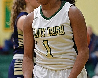 YOUNGSTOWN, OHIO - DECEMBER 7, 2016: Dayshanette Harris #1 of Ursuline celebrates after drawing an and one during the first half of their game Wednesday night at Ursuline High School. DAVID DERMER | THE VINDICATOR
