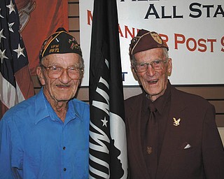 SPECIAL TO THE VINDICATOR
At a special ceremony at Ellsworth VFW, Homer Marsh and Daniel King, two WWII prisoners of war, were honored for their service. Marsh, left, of Austintown, enlisted on Dec. 7, 1943, and became a member of the U.S. Army 21st Tank Battalion 10th Armored Division and served in the European Theater. He was captured in Germany and spent 35 days in a POW camp. He was released from service in January 1946. King, of Lordstown, formerly of North Jackson, enlisted in the Army Air Corps in October 1942. He became a flight instructor and was shipped to England and assigned to the 384th Squadron of the 365th Flight Group, where he flew P-51 Mustangs. On his 30th mission, while accompanying a bomber squadron in Germany, his aircraft developed engine trouble and he had to bail out. He was captured and held in Germany until June of 1945.