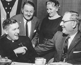 04091960 malone Bishop James Malone talks with Warren .Mayor Burbank Mahohning GOP chairman Bailey and Roemary Gilronan.