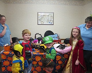 Neighbors | Alexis Bartolomucci.Children who participated in the Beyond Expectations Speech Therapy trick or treat event on Oct. 21 had the chance to visit with therapy bunnies with F5RS.