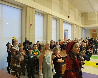 Neighbors | Alexis Bartolomucci.Students from Austintown Elementary School lined up during the Fall Festival on Oct. 27 as they waited to hear the winners of the costume contest.