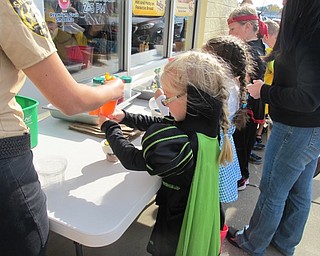 Neighbors | Alexis Bartolomucci.Children decorated their cupcakes with icing and sprinkles at the Cornersburg Dairy Queen on Oct. 29 after the pumpkin hunt.