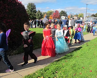 Neighbors | Alexis Bartolomucci.Robinwood Lane Elementary Students walked around the building on Oct. 28 to show off their Halloween costumes.