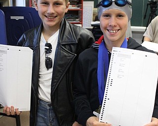 Neighbors | Abby Slanker.Two Canfield Village Middle School students were prepared to vote, with ballots in hand, during the school’s mock presidential election Oct. 28.