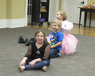 Neighbors | Alexis Bartolomucci.Children at the Halloween Howls program at the Poland library on Oct. 25 sat on the floor as they waited to play a game.