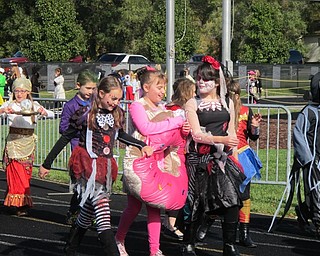 Neighbors | Alexis Bartolomucci.Students from Dobbins and Union Elementary school participated in the Halloween parade at Poland Seminary High School on Oct. 28.