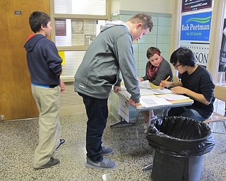 Neighbors | Alexis Bartolomucci.Students checked in before they voted in the mock election at Boardman Glenwood Junior High on Nov. 1.