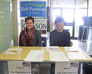 Neighbors | Alexis Bartolomucci.Anna Leshinsky and Vinh Nguyen worked the voter registration line during the mock election on Nov. 1 at Boardman Glenwood Junior High.