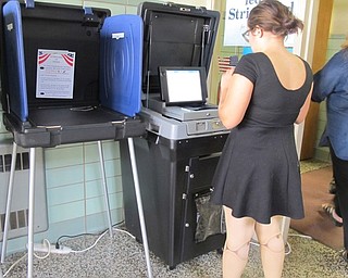 Neighbors | Alexis Bartolomucci.One of the students submitted her ballot after voting in the mock election at Boardman Glenwood Junior High on Nov. 1.