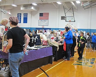 Neighbors | Alexis Bartolomucci.Guests shopped at the different vendors at the Holiday Shop at Poland Seminary High School on Nov. 5.