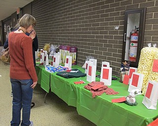 Neighbors | Alexis Bartolomucci.Guests looked at the prizes for the raffle during the annual Poland Union Holiday Shop on Nov. 5 at Poland Seminary High School.