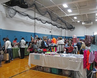 Neighbors | Alexis Bartolomucci.People filled the Poland Seminary High School gymnasium looking at different products vendors brought in for the annual Holiday Shop on Nov. 5.