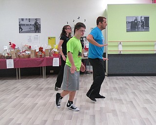 Neighbors | Alexis Bartolomucci.Viktor Slipski worked on his dance routine with Paul Miletta at Limitless Dance Company on Nov. 9.